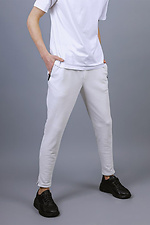 Трикотажные спортивные штаны зауженного кроя белого цвета VDLK 8031147 фото №6