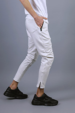 Трикотажные спортивные штаны зауженного кроя белого цвета VDLK 8031147 фото №8