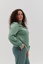 Блуза с воротником-стойка зеленого цвета Garne 3041203 фото №11