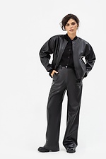 Жіночі широкі штани з еко-шкіри чорного кольору Garne 3041465 фото №8
