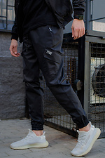 Чорні коттонові штани карго з великими кишенями з боків Without 8048498 фото №1