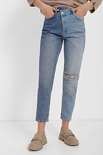 Двухцветные женские джинсы укороченного кроя с рванкой  4014536 фото №1
