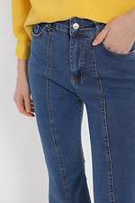 Клешные синие джинсы с разрезами спереди  4014603 фото №5