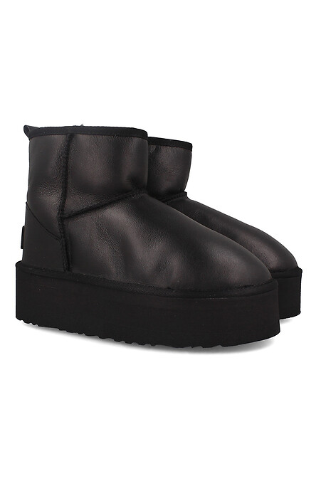 Women's winter ugg boots made of genuine leather on a high sole. Uggs. Color: black. #4203223