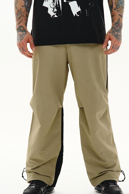 Wide trousers made of stretch nylon "Yamaguti", light olive - #8037481