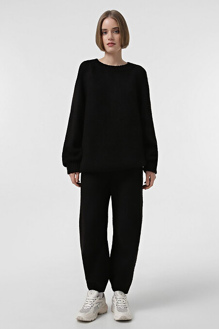 Schwarzer Strickanzug für Damen. Anzüge. Farbe: das schwarze. #4038638