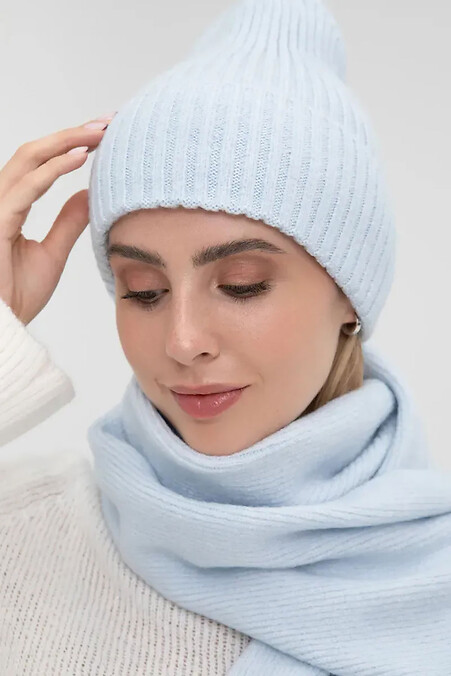 Women's knitted hat in blue color - #4038850