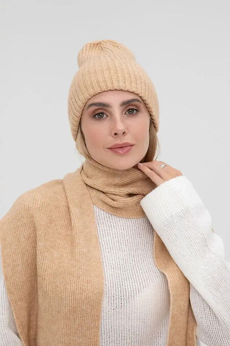 Women's knitted hat in beige color - #4038852