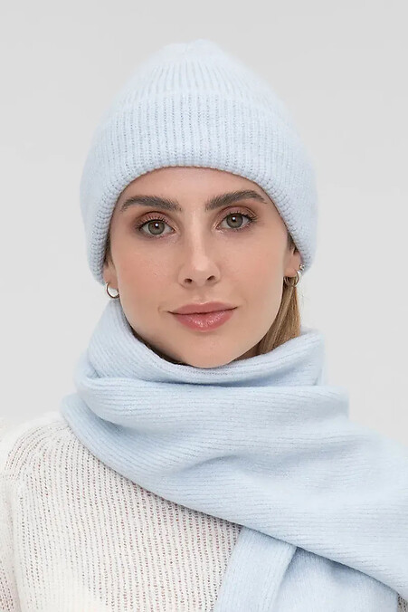 Women's knitted hat in blue color - #4038857