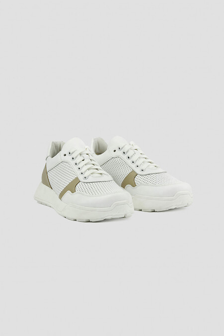 Białe skórzane sneakersy damskie z perforacją i zdobionymi wstawkami. Trampki. Kolor: biały. #4205859