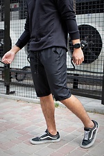 Knielange Jogginghose aus schwarzer Baumwolle Without 8048014 Foto №1