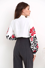 Women's white blouse in ethnic style with puff sleeves on the cuffs NENKA 3103019 photo №2