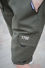 Gerade, knielange Shorts in Khaki mit Taschen und Reflektoren Without 8048022 Foto №6