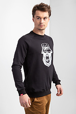 Schwarzes Strick-Sweatshirt mit Raglanärmeln und weißem Muster GEN 9000024 Foto №2