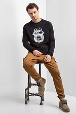 Schwarzes Strick-Sweatshirt mit Raglanärmeln und weißem Muster GEN 9000024 Foto №6