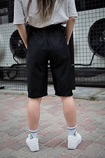 Knee-length straight shorts in black with reflective print Without 8048026 photo №3