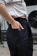 Knee-length straight shorts in black with reflective print Without 8048026 photo №4