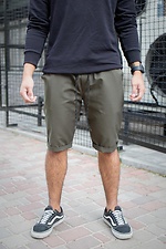 Khakifarbene gerade lange knielange Shorts mit reflektierendem Aufdruck Without 8048027 Foto №2