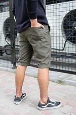 Khakifarbene gerade lange knielange Shorts mit reflektierendem Aufdruck Without 8048027 Foto №4
