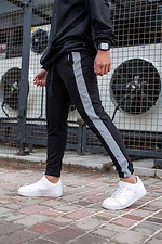 Black jersey sweatpants with reflective stripes Without 8048047 photo №1