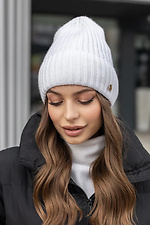 Knitted hat for women Lily white on fleece  4051061 photo №1