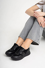 Women's sneakers in a combination of leather and suede in black  4206067 photo №2