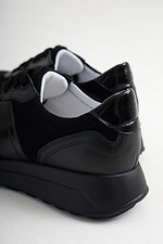 Women's sneakers in a combination of leather and suede in black  4206067 photo №4