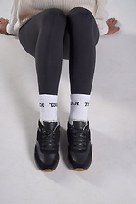 Schwarze Winterstiefel aus Leder und Wildleder 4207067 Foto №2