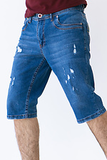 Голубые джинсовые шорты ниже колен с потертостями  4009079 фото №5
