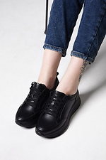 Schwarze Damen-Sneaker aus Leder 4206079 Foto №2