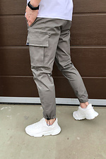 Серые коттоновые брюки карго с затяжками и большими карманами TUR WEAR 8037086 фото №6