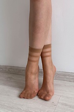 A set of three pairs of thin 15 denier nylon socks in beige  8055089 photo №4