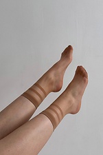 A set of three pairs of thin 15 denier nylon socks in beige  8055089 photo №5