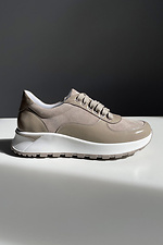 Stylish women's beige sneakers with lacquer inserts.  4206094 photo №1