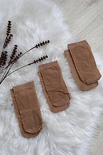 A set of three pairs of thin 20 denier nylon socks in beige  8055097 photo №2