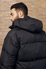 Короткая зимняя куртка пуховик черного цвета с капюшоном ТУР 8037114 фото №8