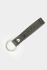 Marken-Schlüsselanhänger aus grauem Echtleder Garne 3300120 Foto №2
