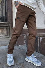 Коттоновые брюки карго зауженные коричневого цвета GEN 8000173 фото №1