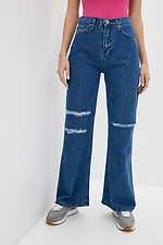 Синие широкие джинсы расклешенные к низу с рванкой 4009218 фото №1