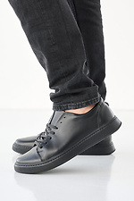 Męskie skórzane sneakersy wiosenno-jesienne w kolorze czarnym  2505230 zdjęcie №1
