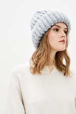 Volumetric knitted hat for the winter with a wide lapel  4038231 photo №1
