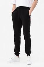 Męskie spodnie sportowe w kolorze czarnym GEN 7775233 zdjęcie №1