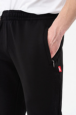 Męskie spodnie sportowe w kolorze czarnym GEN 7775233 zdjęcie №5