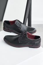 Klassische schwarze Schuhe aus echtem Leder  8019246 Foto №6