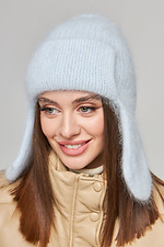 Warm winter hat with earflaps made of coarse angora yarn by Garne 4496250 photo №1