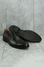 Klassische schwarze Schuhe aus echtem Leder  8019250 Foto №15