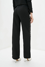 Черные нарядные брюки с кружевными вставками по бокам Garne 3039251 фото №3