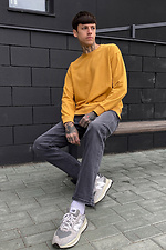 Żółty dzianinowy sweter z okrągłym dekoltem  4009264 zdjęcie №2