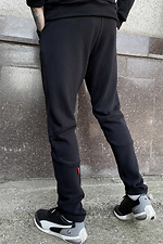 Черные спортивные штаны трикотажные зауженные к низу GEN 8000265 фото №2