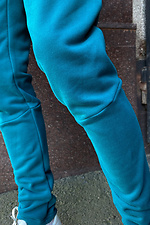 Бирюзовые спортивные штаны узкие из трикотажа GEN 8000266 фото №4